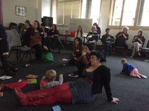 A family friendly workshop - toddlers on the floor with participants