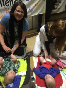 Nappy changing at a family friendly refugee action